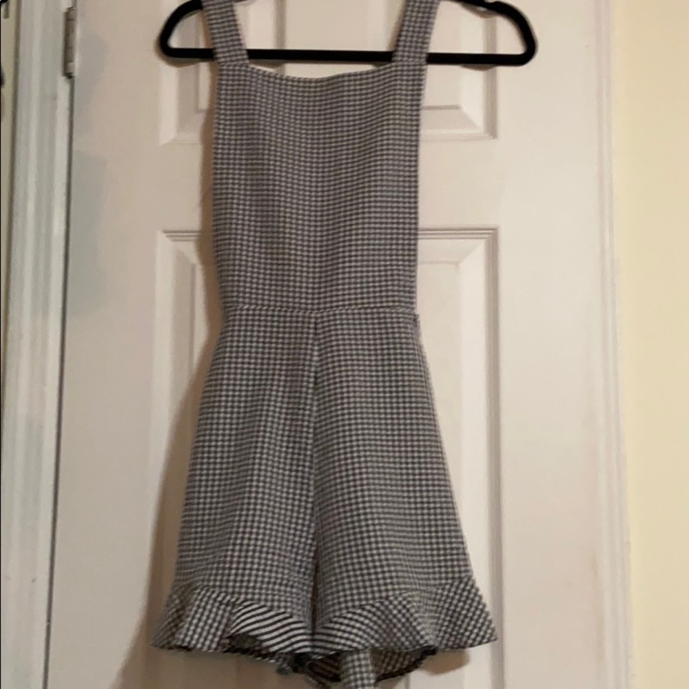 Checkered one-piece with a flared trim- SOLD